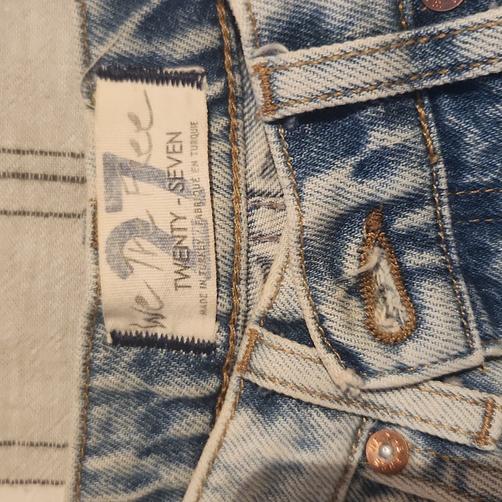 A pair of We the Free Jeans